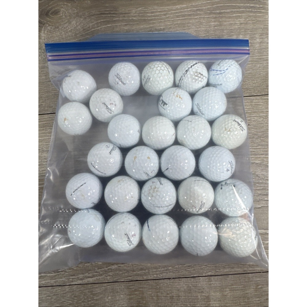 Over 2 DOZEN ASSORTED  USED PRO V1 TITLEIST  GOLF BALLS. Condition Varies